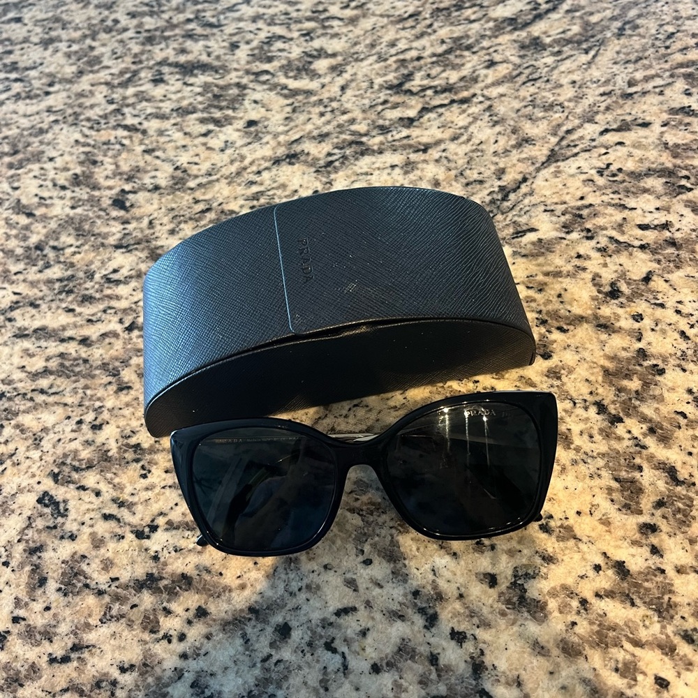 Prada Elegant Black Sunglasses with Case